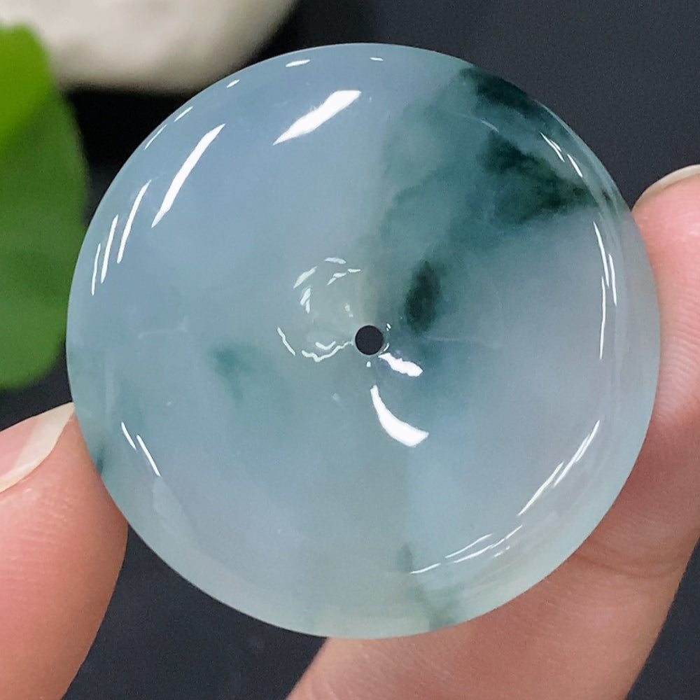 HUILIU HQ jadeite pendant with peace buckle design, weighing approximately 10.94g, showcasing smooth green jade craftsmanship.