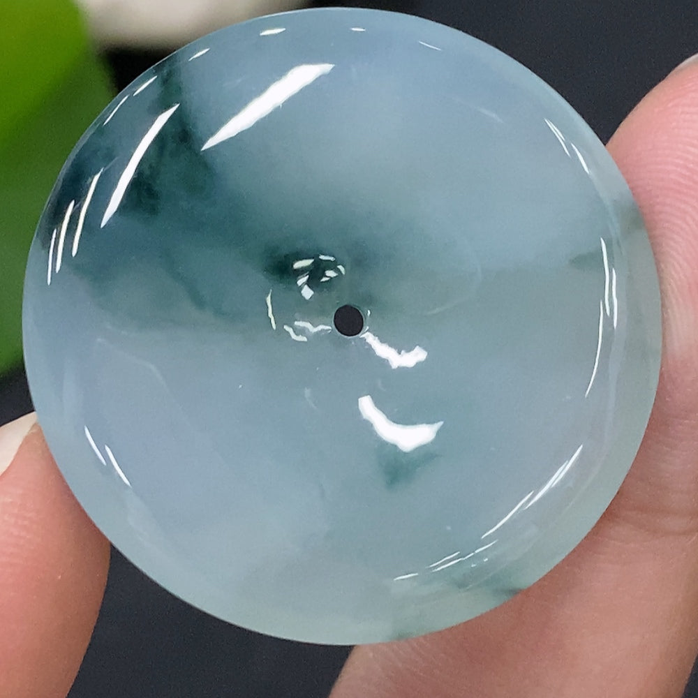 HUILIU HQ jadeite pendant with peace buckle, approx. 10.94g, featuring smooth green jade with intricate carving details.