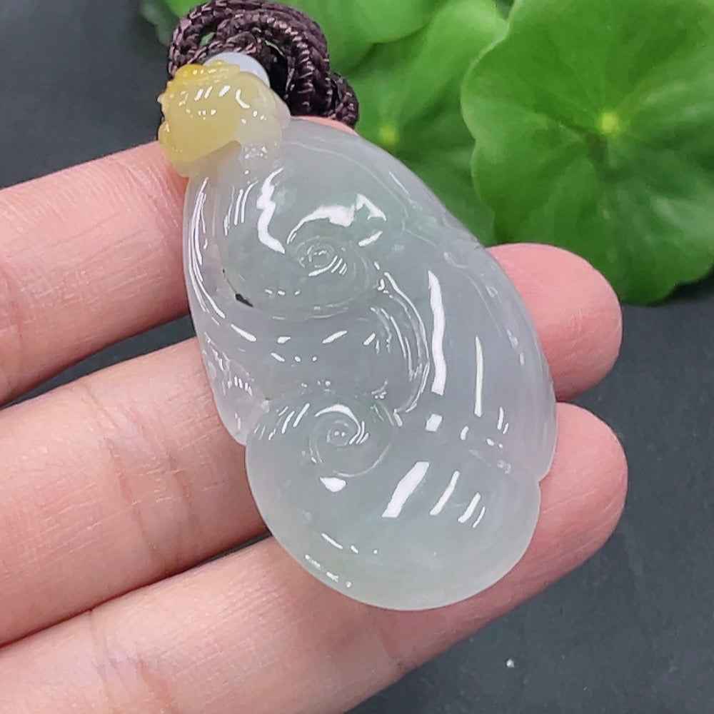 HUILIU HQ jadeite Ruyi pendant, approximately 23.8g, featuring a smooth green jade design with intricate carvings.