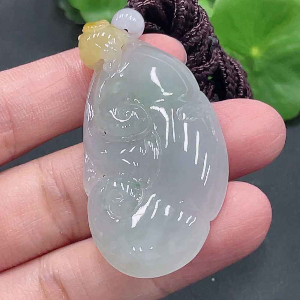 Jadeite Ruyi pendant from HUILIU HQ, showcasing intricate jade craftsmanship, weighing approximately 23.8 grams.