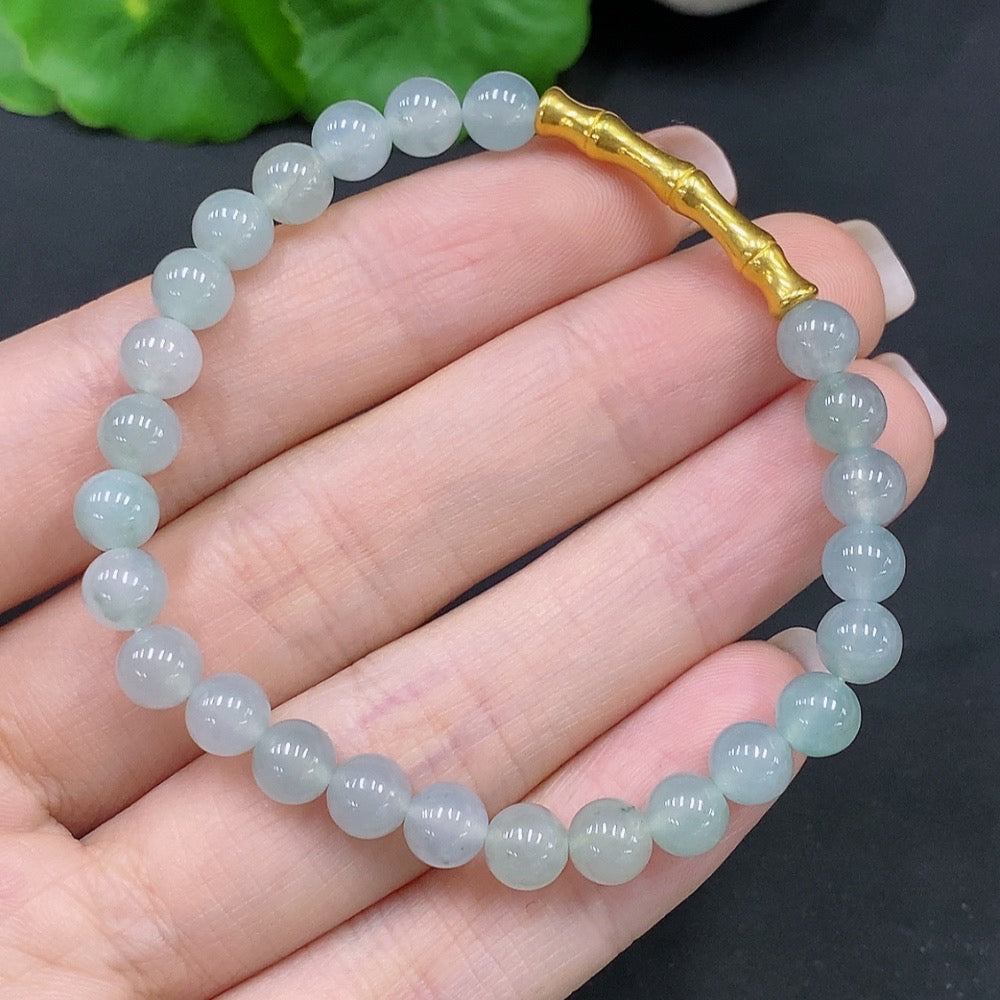 Natural Grade A jadeite bead bracelet by HUILIU HQ, 5.8mm jade beads, crafted with high-quality certified jade jewelry.