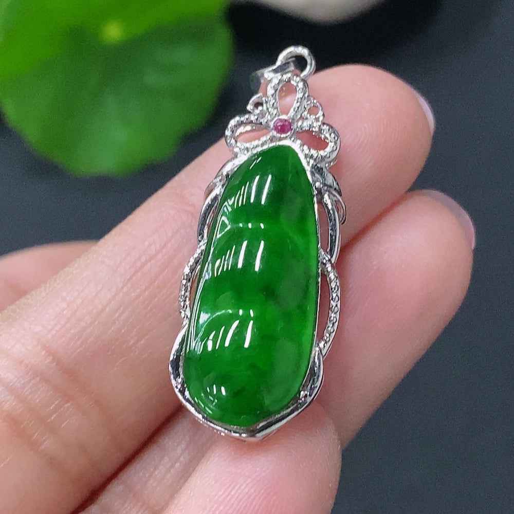 Natural Grade A jadeite lucky bean pendant with inlaid design from HUILIU HQ, showcasing vibrant green jade and intricate craftsmanship.
