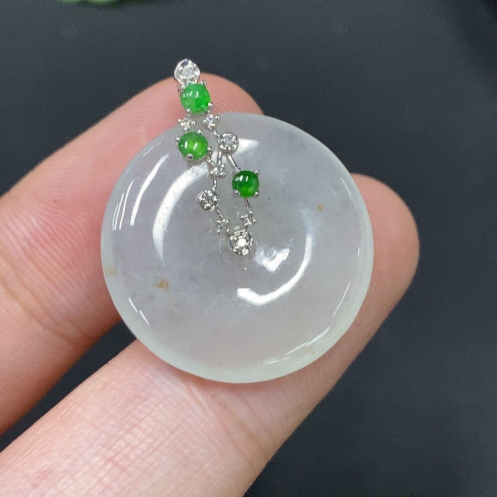 Huiliu HQ Natural Grade A Jadeite Peace Pendant, smooth green jade with carved peace symbol, certified by Huiliu, close-up view