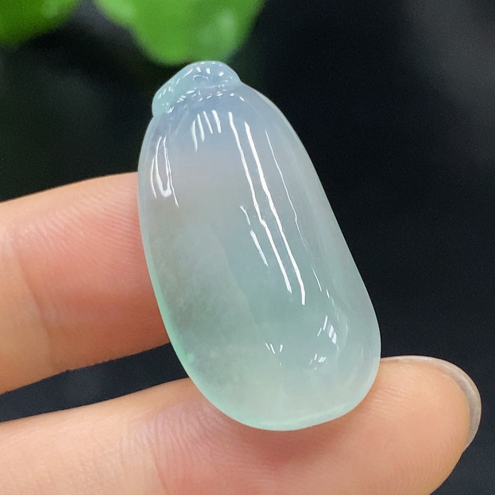 Natural Grade A jadeite pendant featuring Fu Gua design from HUILIU HQ, showcasing smooth, polished jade with carved detailing.