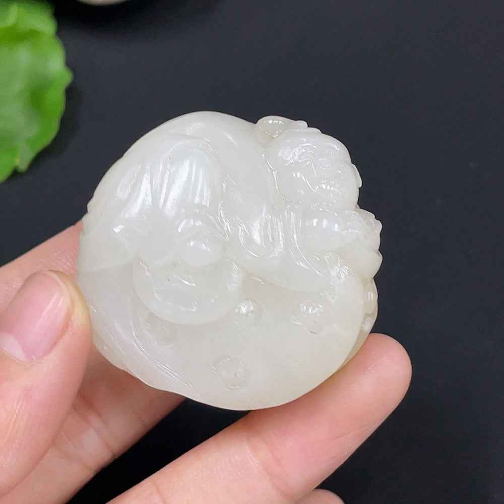 Natural Grade A jadeite pendant for children, HUILIU HQ certified, showcasing smooth, polished jade with a delicate design.