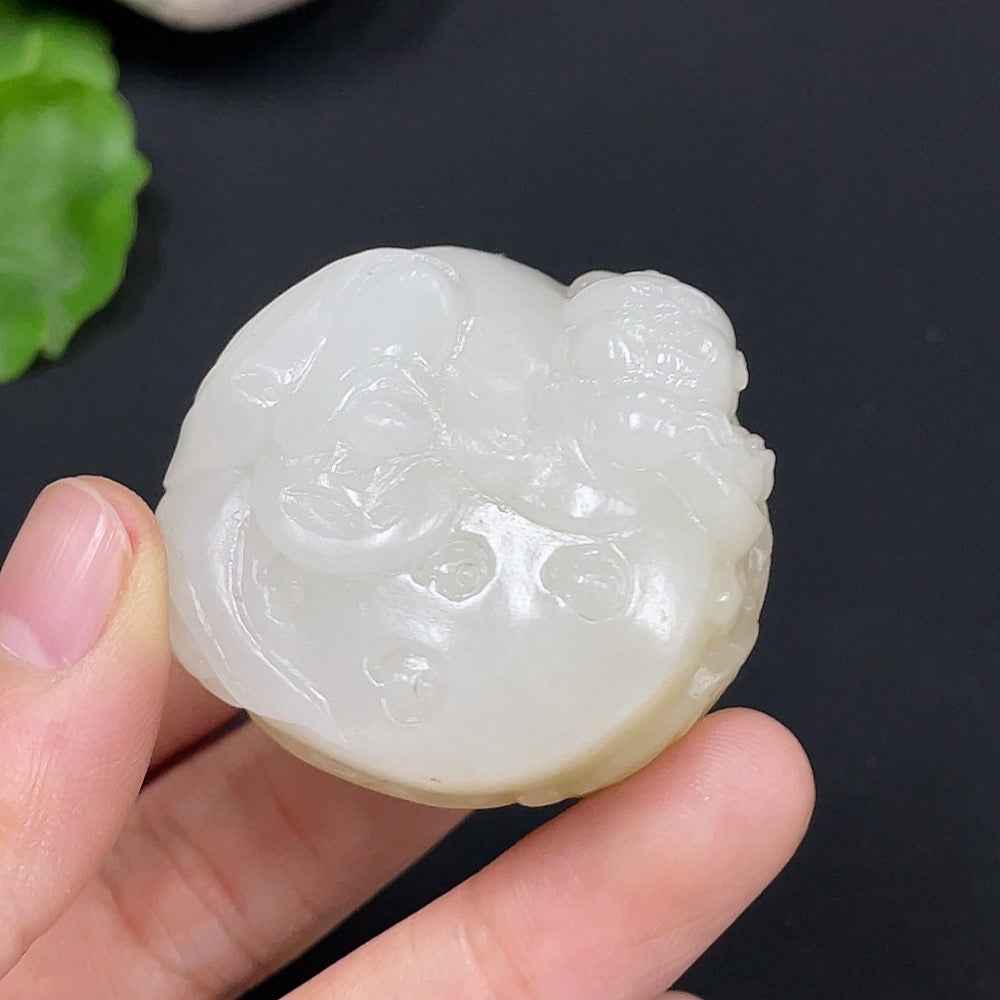 Natural Grade A Jadeite pendant for children, HUILIU HQ certified, showcasing smooth, polished jade with a delicate design.