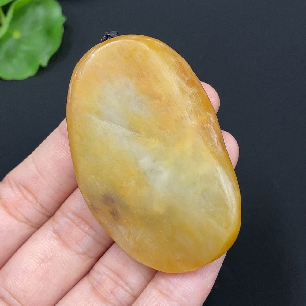 Natural Grade A Jadeite pendant featuring the God of Wealth design from HUILIU HQ, includes rope, undetermined skin color formation.