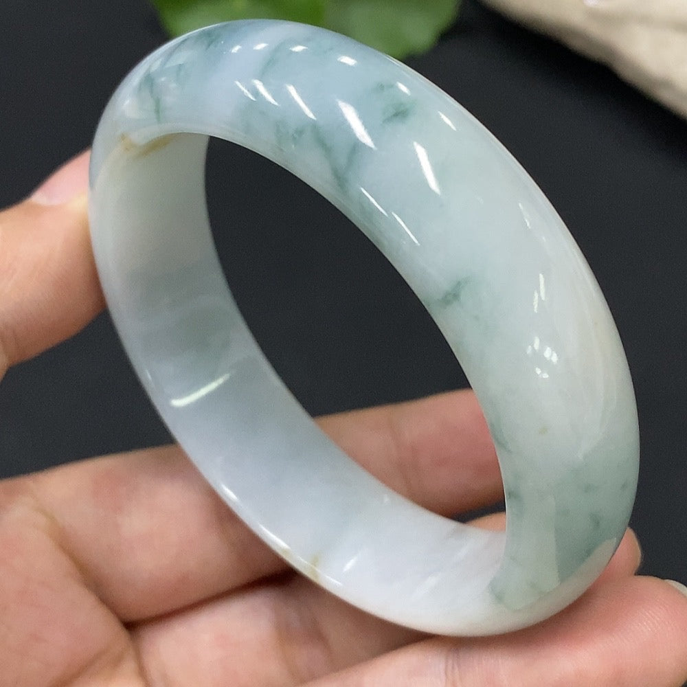 Huiliu Certified Natural Grade A Jadeite round bracelet, size 53.9, weighing approx. 52.66g, showcasing smooth, polished jade beads.