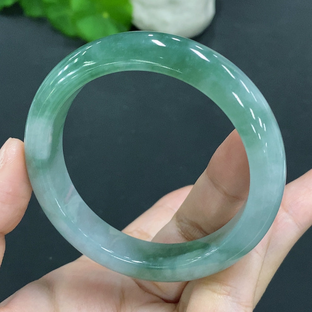 Natural Grade A jadeite round bracelet by HUILIU HQ, size 55.2mm, weighs approx. 55.9g, certified jade jewelry.