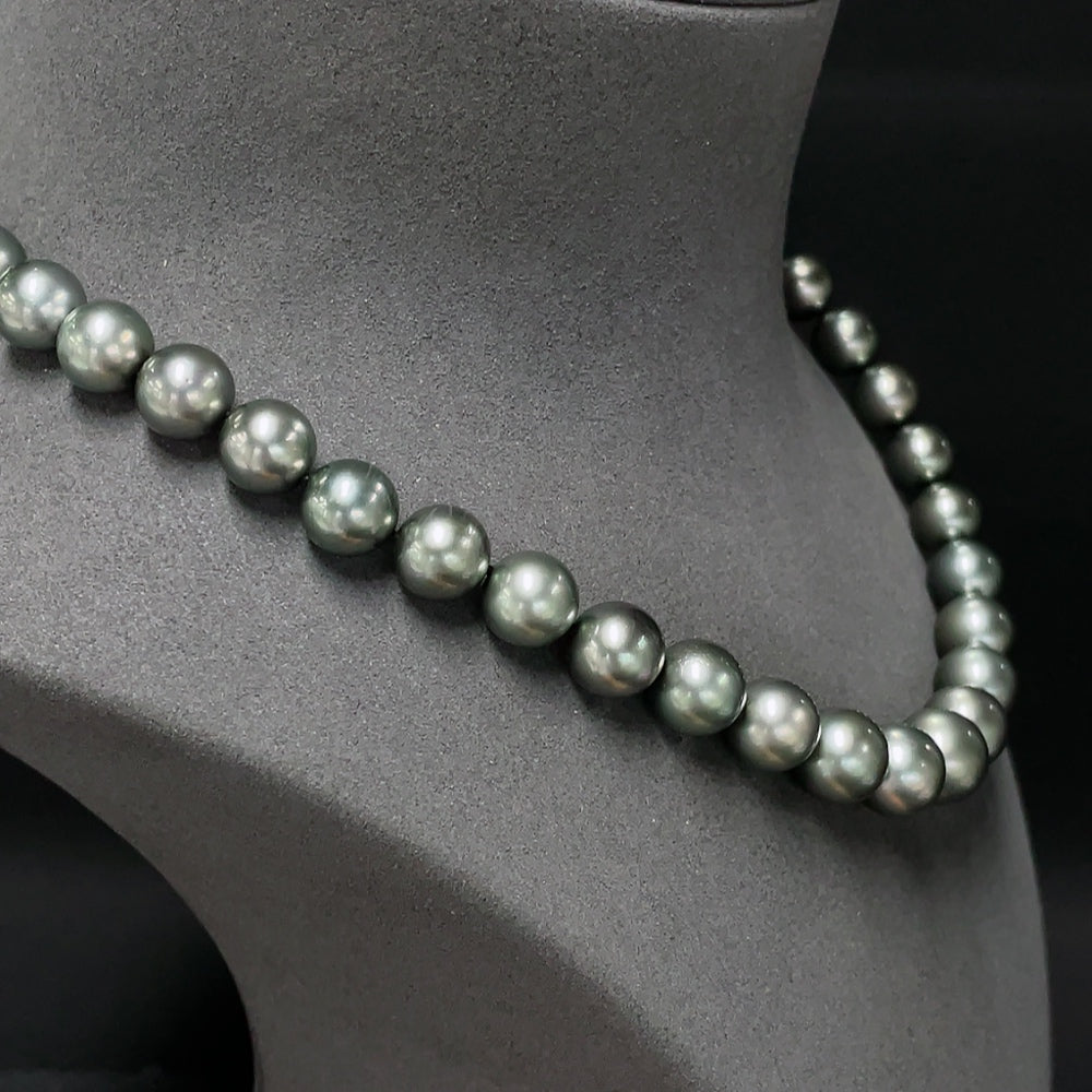 Seawater pearl necklace by HUILIU HQ with 12.1mm non-blemished pearls, certified Huiliu, displayed on a neutral background.