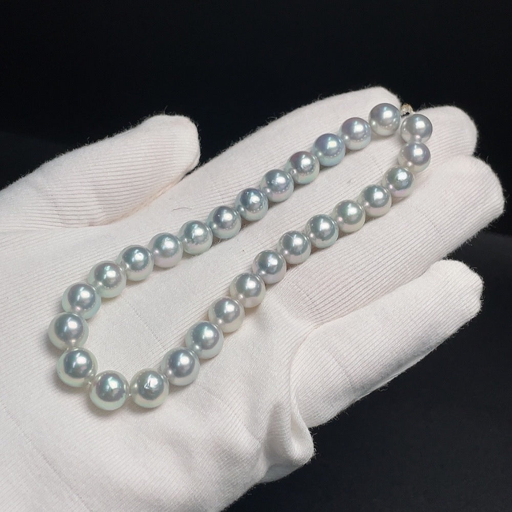 Seawater pearl strand with 8.2mm pearls, approximately 22.07g, natural color, by HUILIU HQ, displayed on a neutral background.