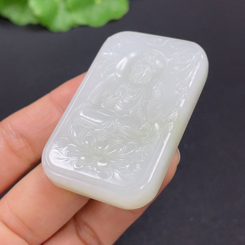 Huiliu certified Hetian jade Guanyin pendant showcasing detailed craftsmanship and smooth, polished surface.