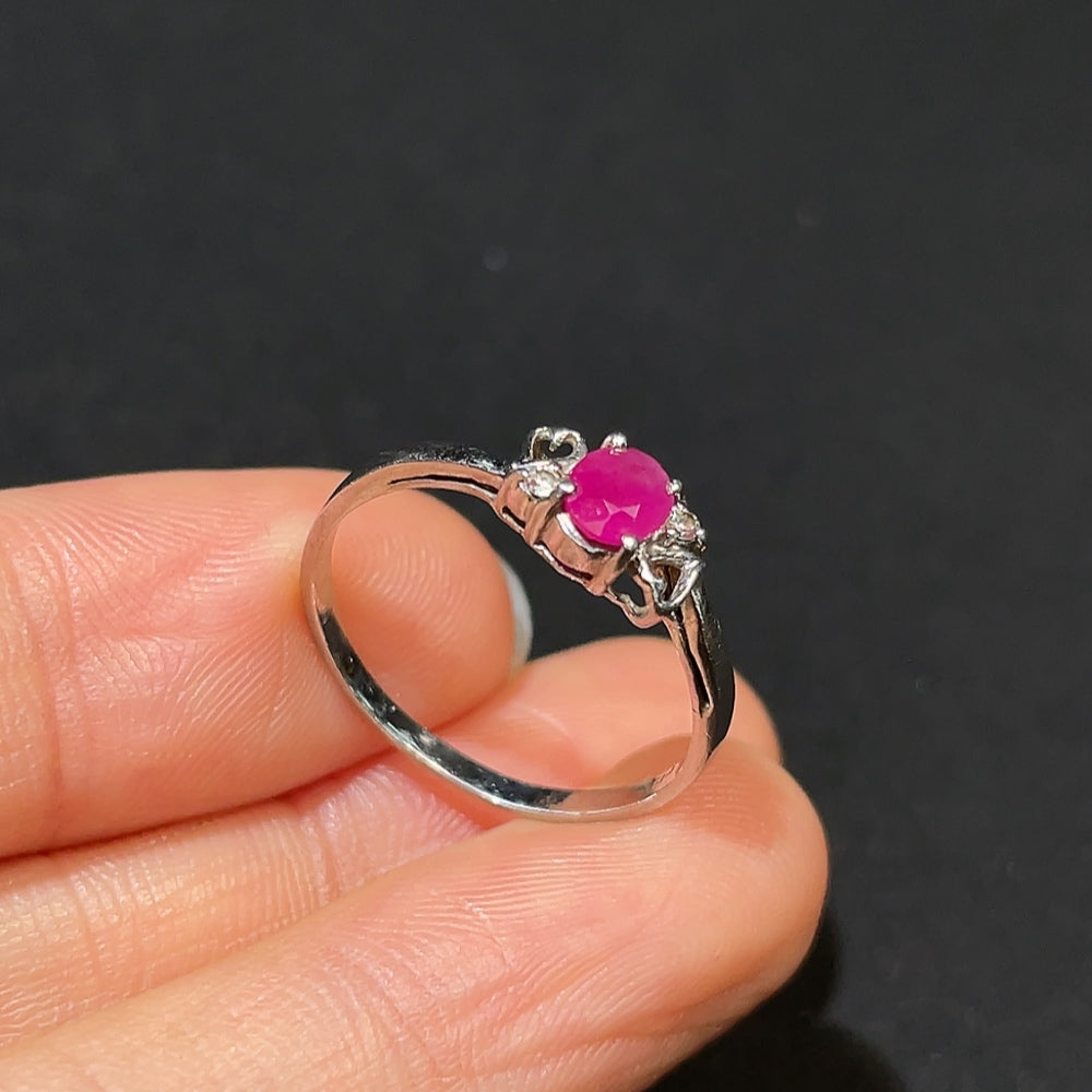 Diamond-accent ruby ring in platinum, size 14, with a total weight of 2.26g, showcasing vibrant gemstones and elegant design.