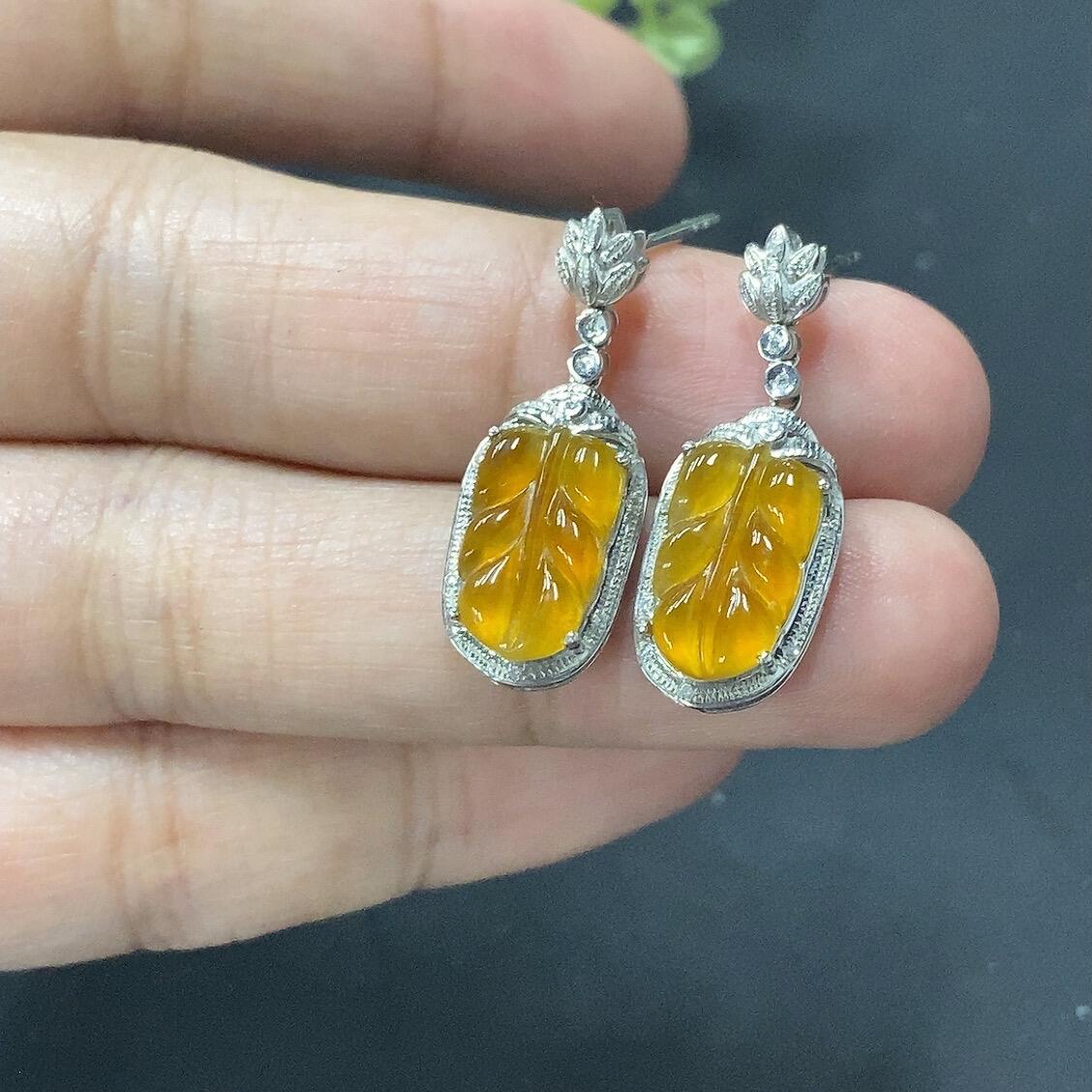 A pair of 18K gold inlaid jade earrings, total weight 3 grams