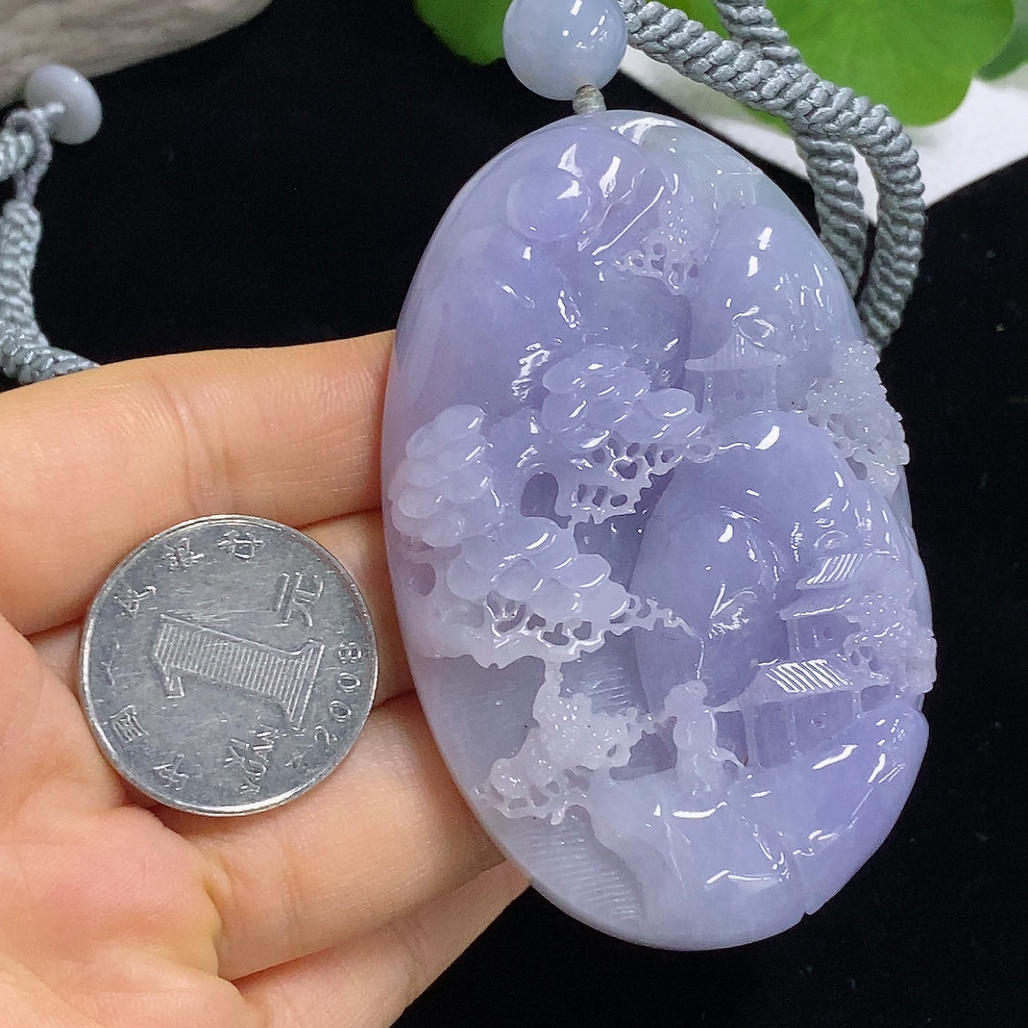 Jadeite pendant featuring a landscape design with a rope bail, weighs approximately 110.3g, crafted by HKHQ.