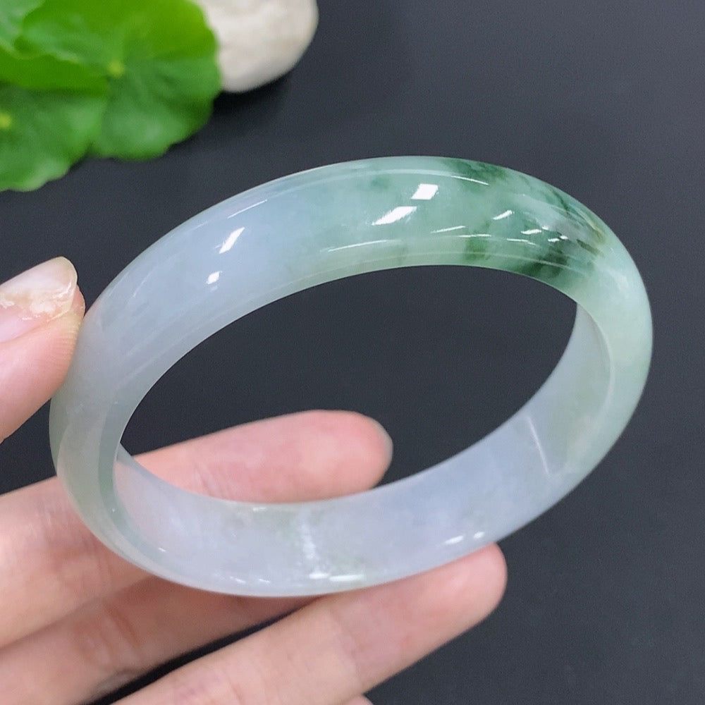 HKHQ jadeite round bangle, 58mm size, weighing approximately 48.4g, smooth jade jewelry with polished finish.