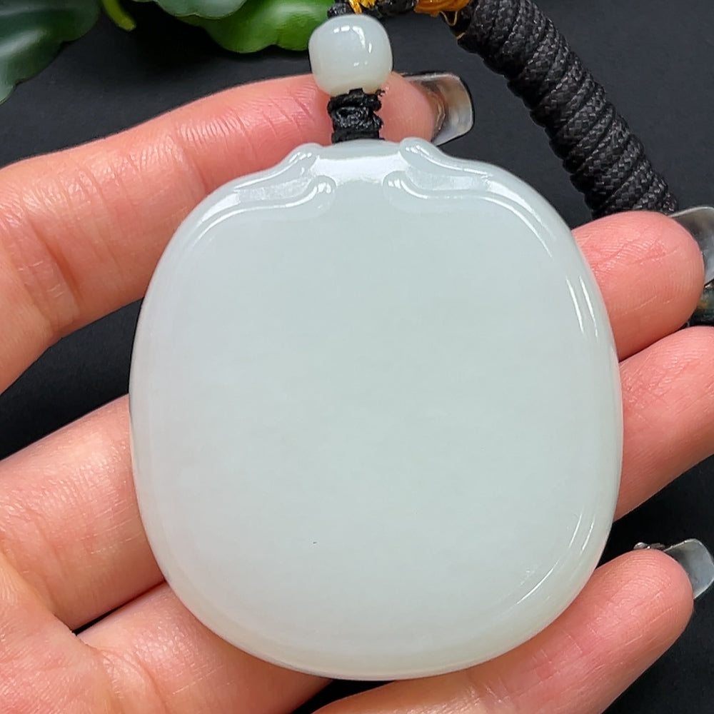 Heitian jade plain pendant with rope, weighing approximately 64.08g, crafted by HKHQ, showcasing smooth, polished jade surface.