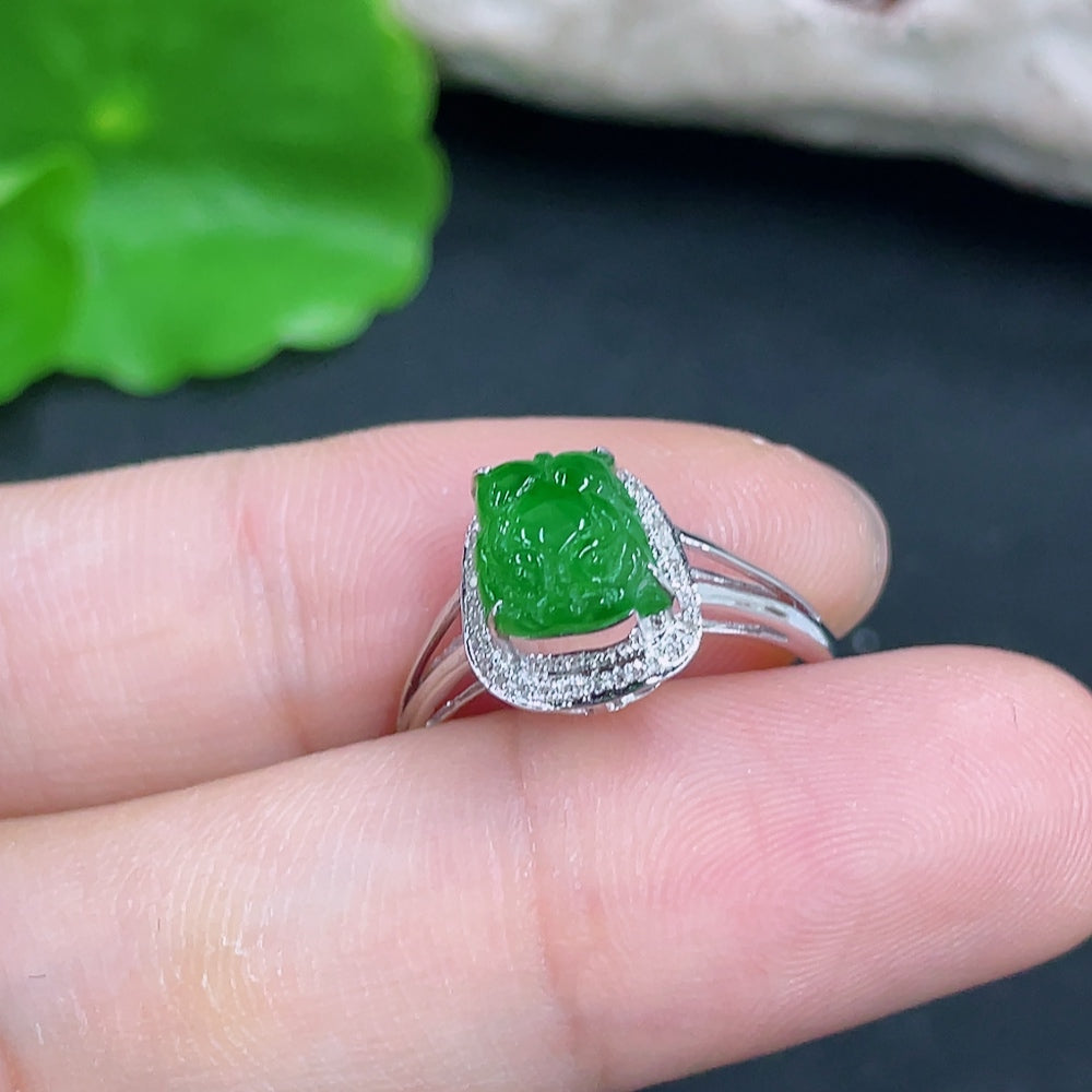 Jadeite ring with 18k gold band and diamond accent, size 13, displayed on a neutral background.