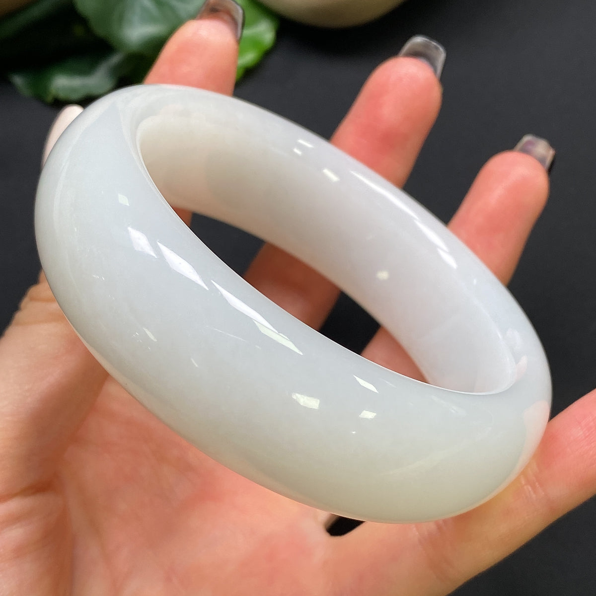HKHQ Hetian Jade round bracelet, 59.6mm diameter, weighs 112.13g, showcasing smooth, polished jade beads in natural green tones.
