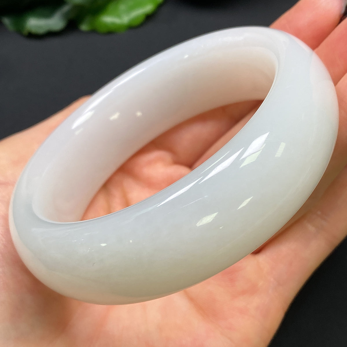 Hetian jade round bracelet with a 59.6mm diameter, weighing approximately 112g, featuring smooth, polished jade beads.