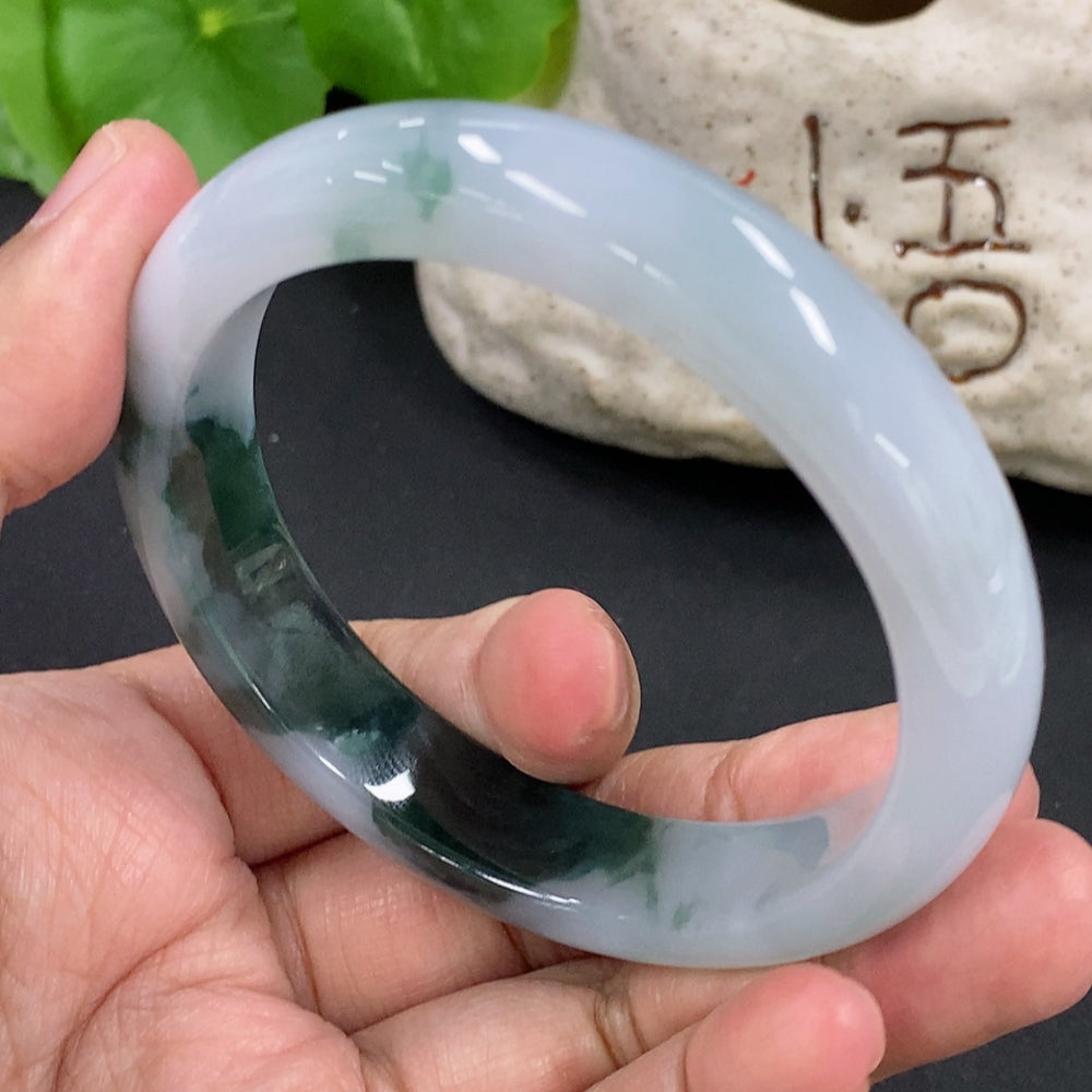HKHQ jadeite round bangle with a 55.5mm size, weighs approximately 51.68g, showcasing smooth, polished jadeite surface.