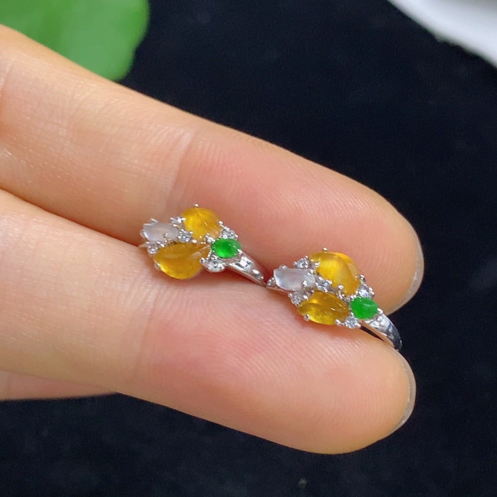 Jadeite ear clips with 18k gold and diamond accents, total weight approximately 2.18 grams