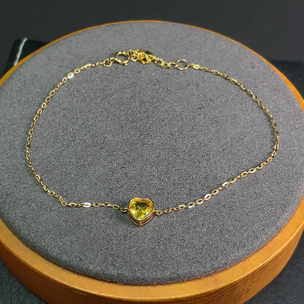 18k gold sapphire inlaid bracelet with gemstones, lightweight jewelry featuring elegant design and natural blue sapphires.