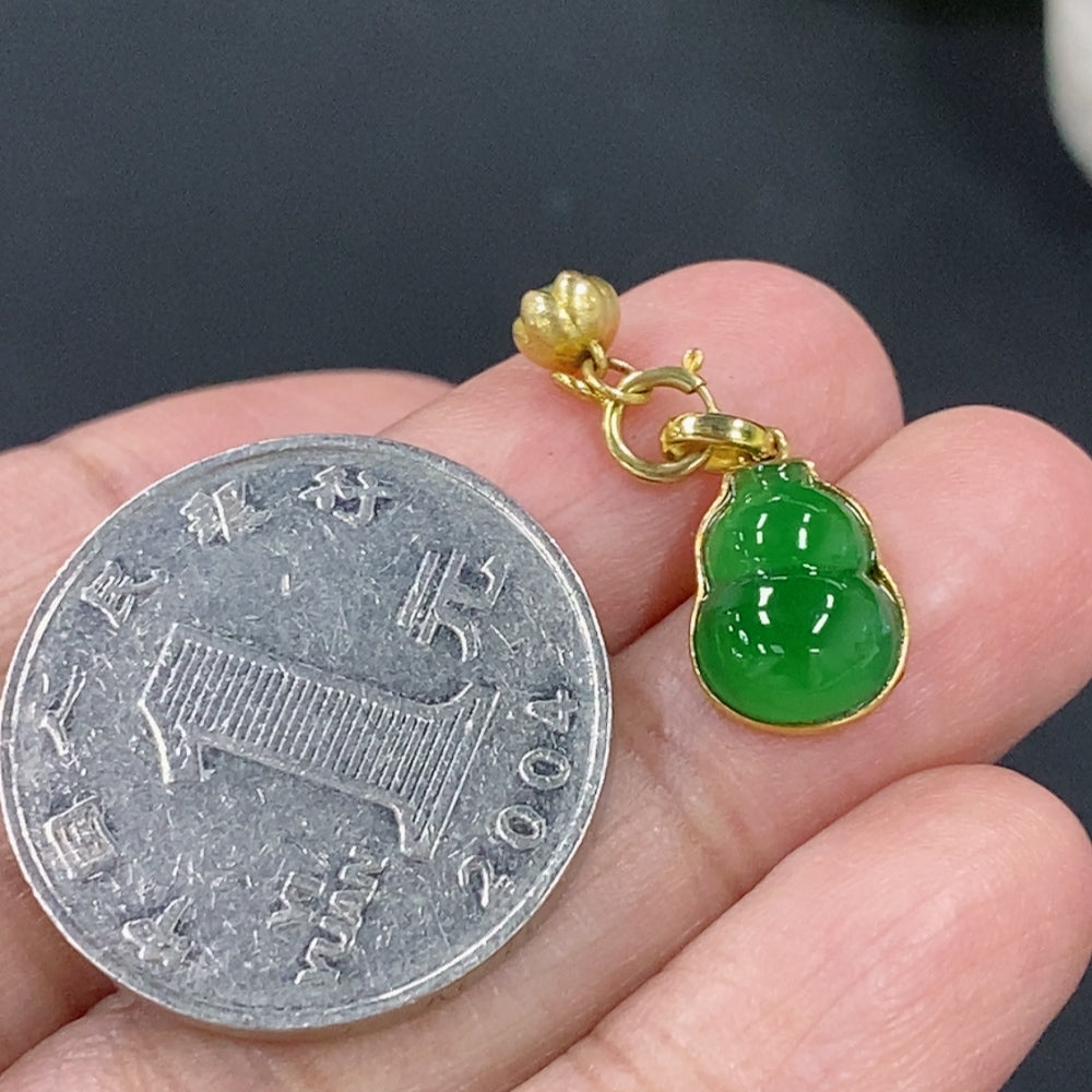 Jadeite gourd pendant with 18K gold inlay, lightweight jade jewelry, HKHQ brand, showcasing intricate craftsmanship.