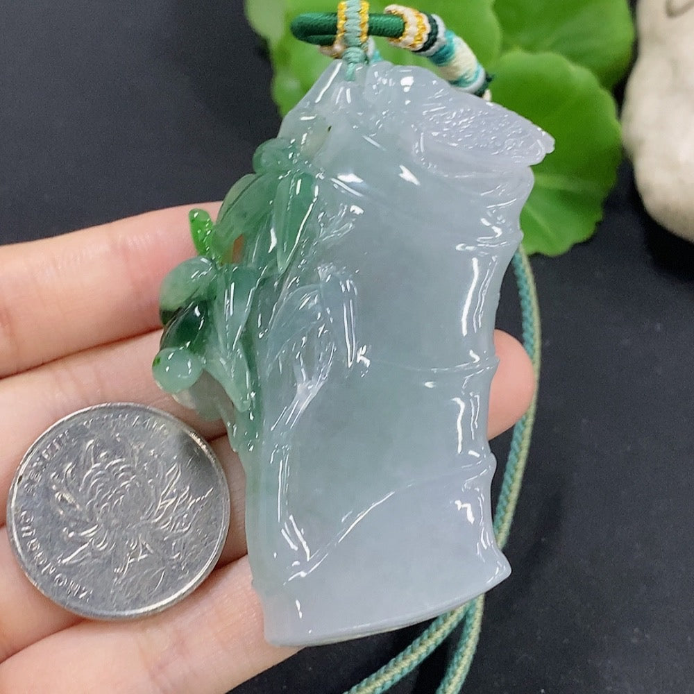 Jadeite bamboo pendant with mineral accents, weighs approximately 59.89g, featuring a natural jade and mineral components.