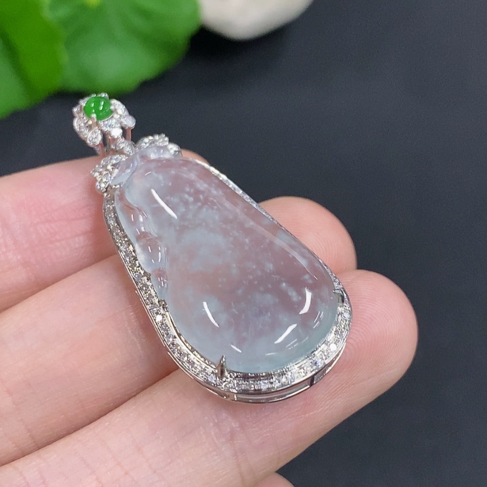 Jadeite auspicious gourd pendant with 18K gold and diamond accents, showcasing a polished jade jade pendant with intricate details.