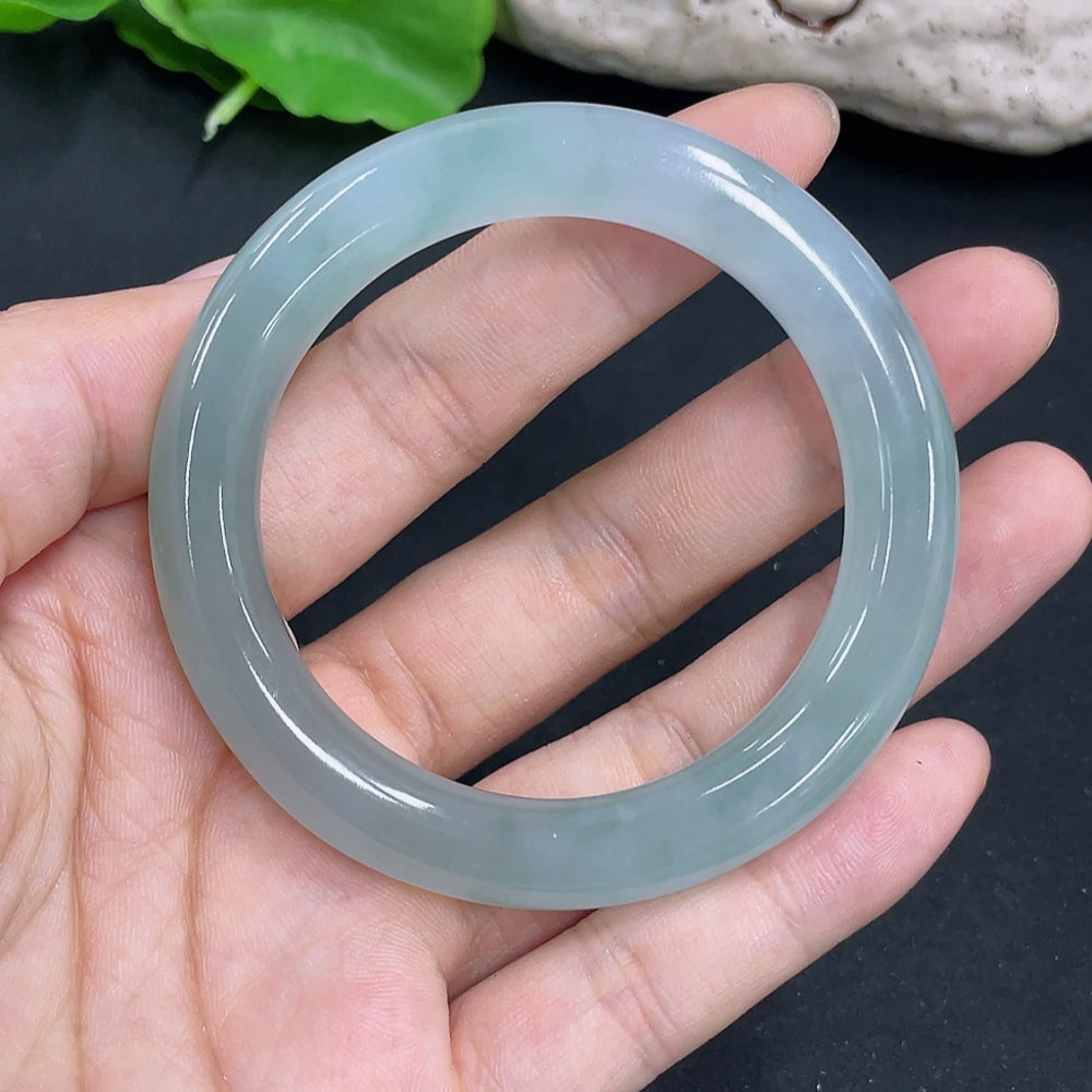 HKHQ jadeite round bangle in size 50.6 with a weight of 47.4g, showcasing smooth, polished jadeite craftsmanship.