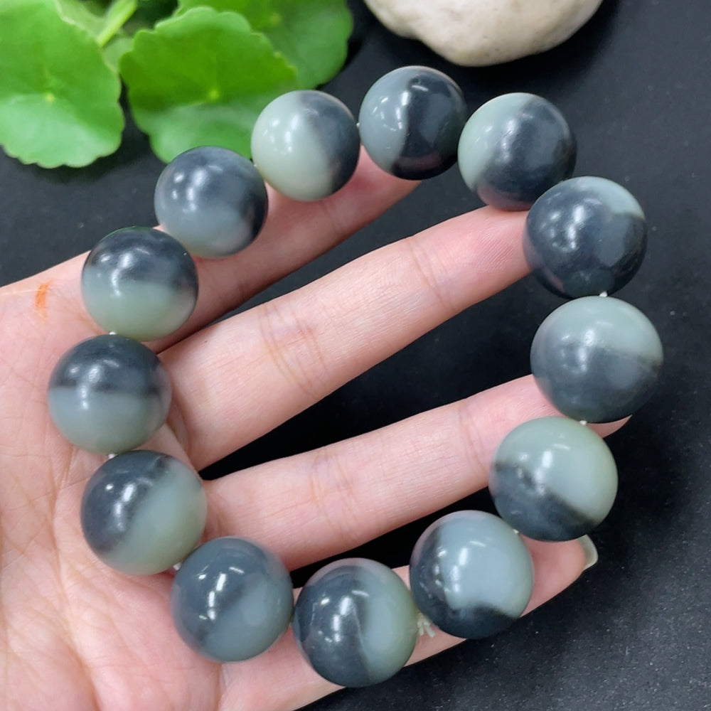 HKHQ Hetian Jade bracelet with 17.8mm beads, totaling approximately 114.9g, showcasing smooth, polished jade stones.