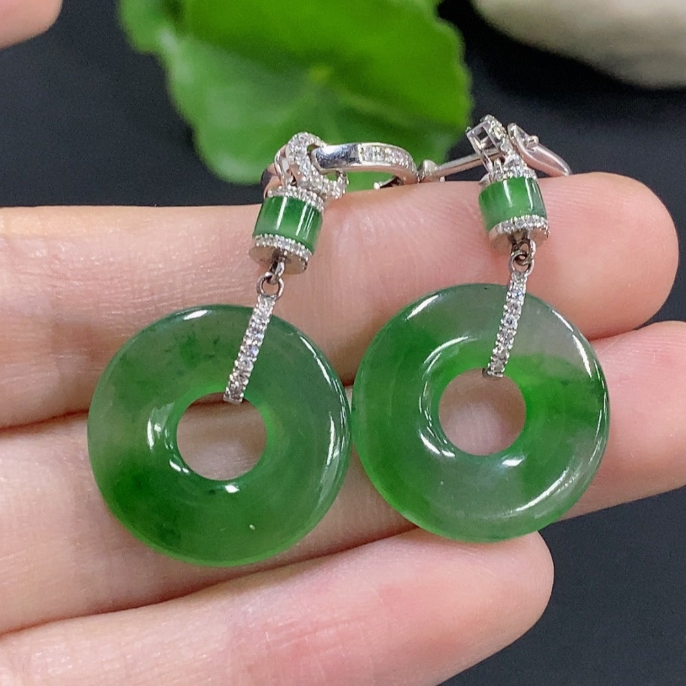 HKHQ jadeite donut inlaid earrings with 18k gold, diamond accents, and no stamp, weighing approximately 6.7g.