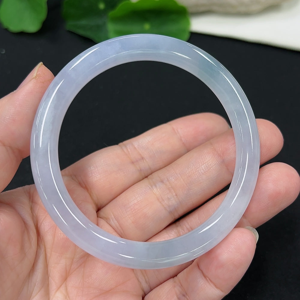 Jadeite round bangle from HKHQ, size 54.7, with a total weight of 27.7g, showcasing smooth, polished green jade jewelry.