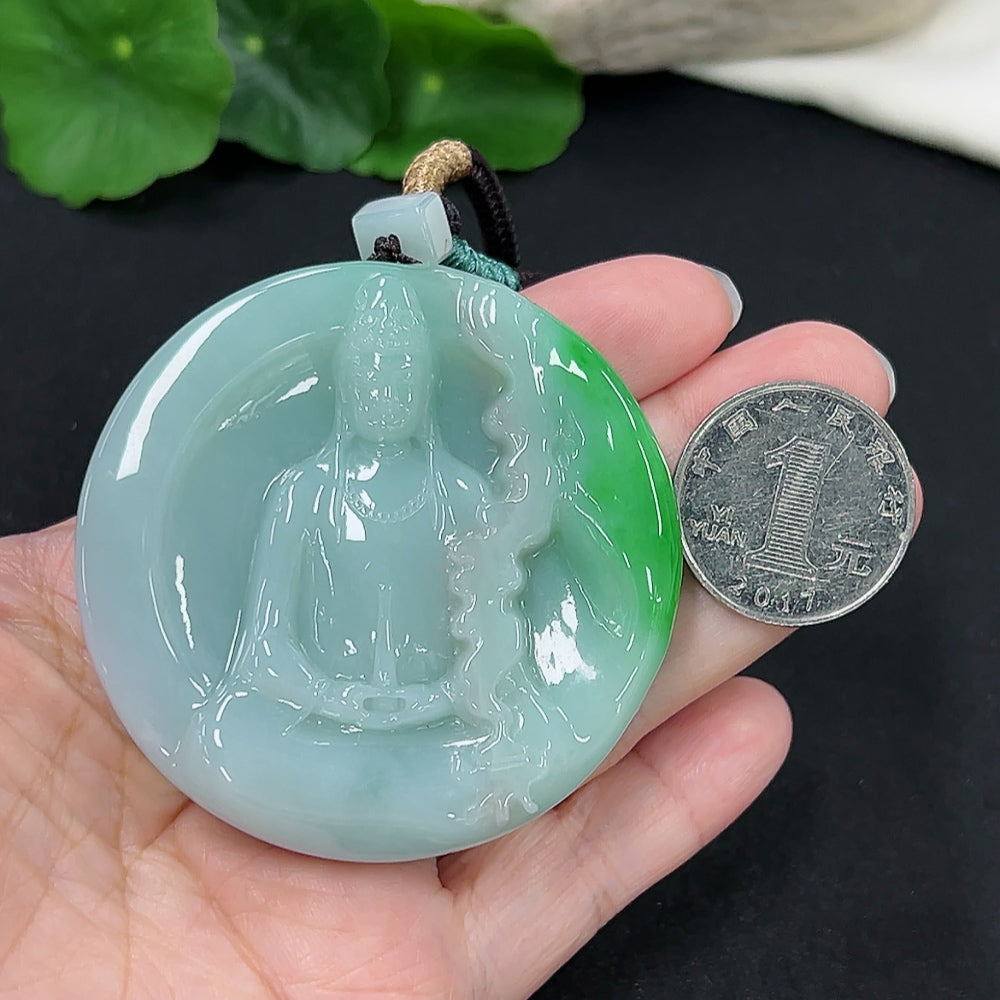 Jadeite Guanyin pendant with intricate carvings, hanging on a rope, crafted from green jade, weight approximately 101 grams.