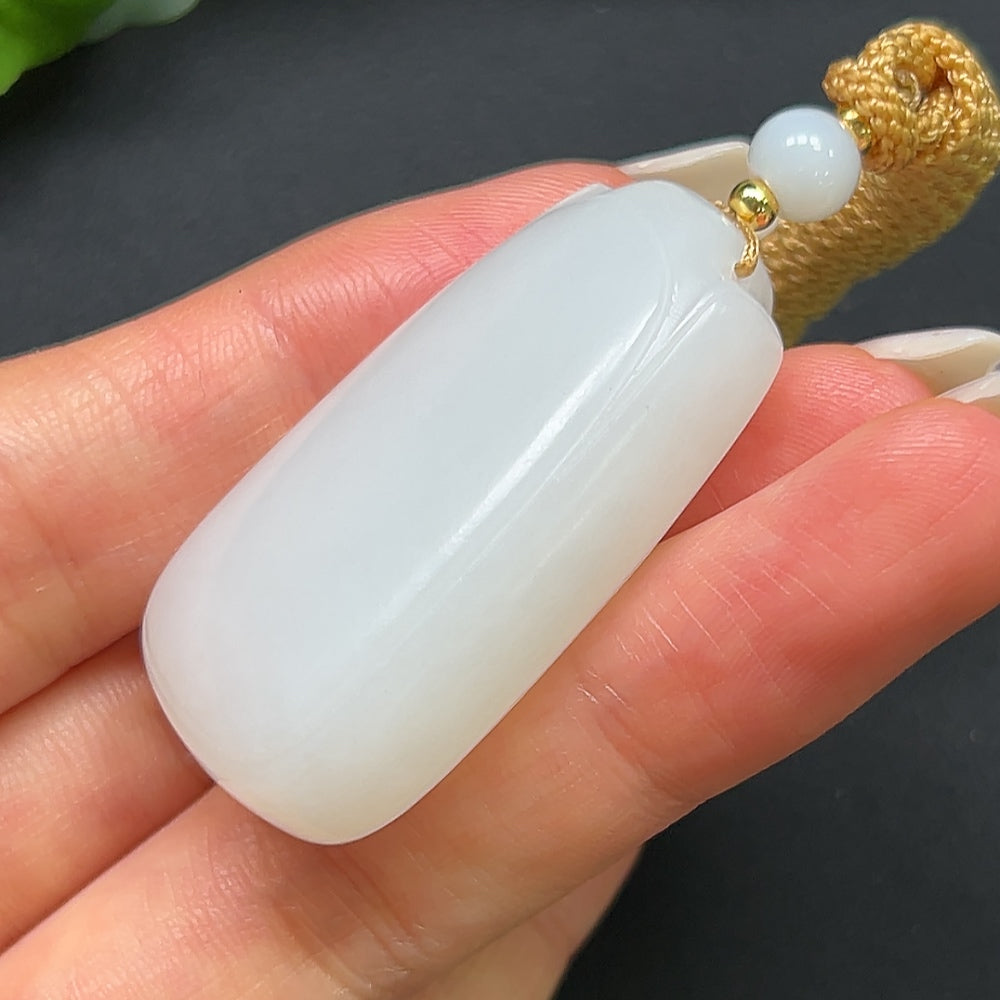Heitian jade plain pendant with rope, weighing approximately 27.31g, featuring smooth, polished jade stone by HKHQ.
