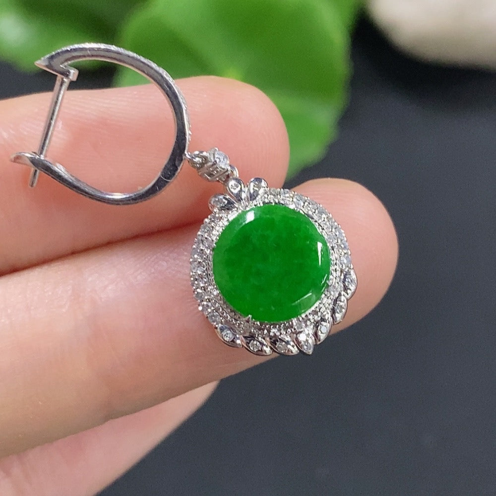 Single jadeite earring with diamond accent in 18K gold by HKHQ, featuring a smooth jadeite stone and sparkling diamond detail.