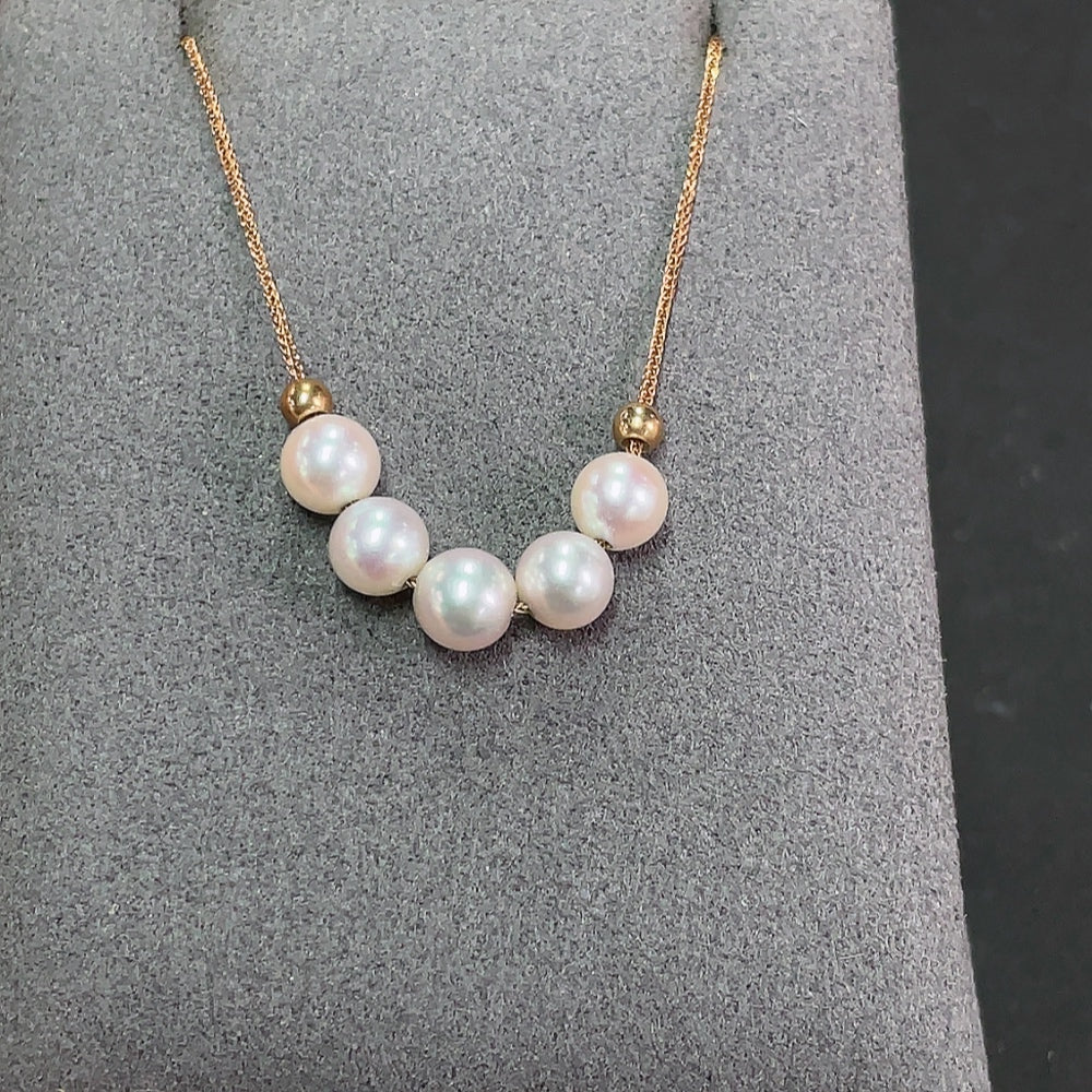 Seawater pearl necklace by HKHQ featuring 18k gold clasp, with 5.6mm pearls, total weight approx. 2.32g.
