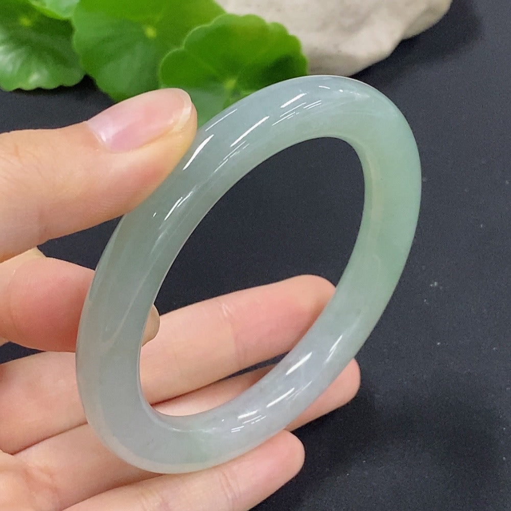 Jadeite round bangle in size 56 with a total weight of 54.11g, crafted by HKHQ, showcasing smooth, polished jade surface.