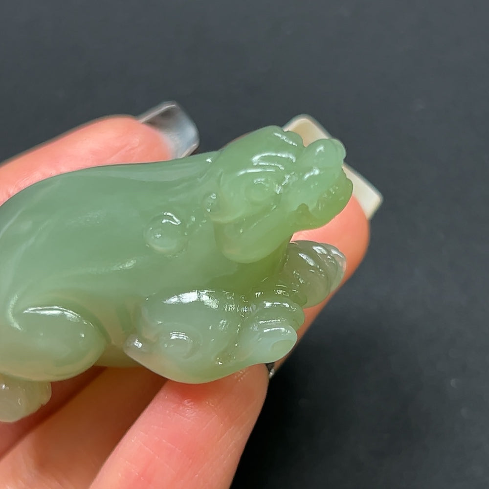 Hetian jade Pi Xiu pendant from HKHQ, handcrafted jade jewelry featuring a detailed Pi Xiu design, weighs approximately 40g.