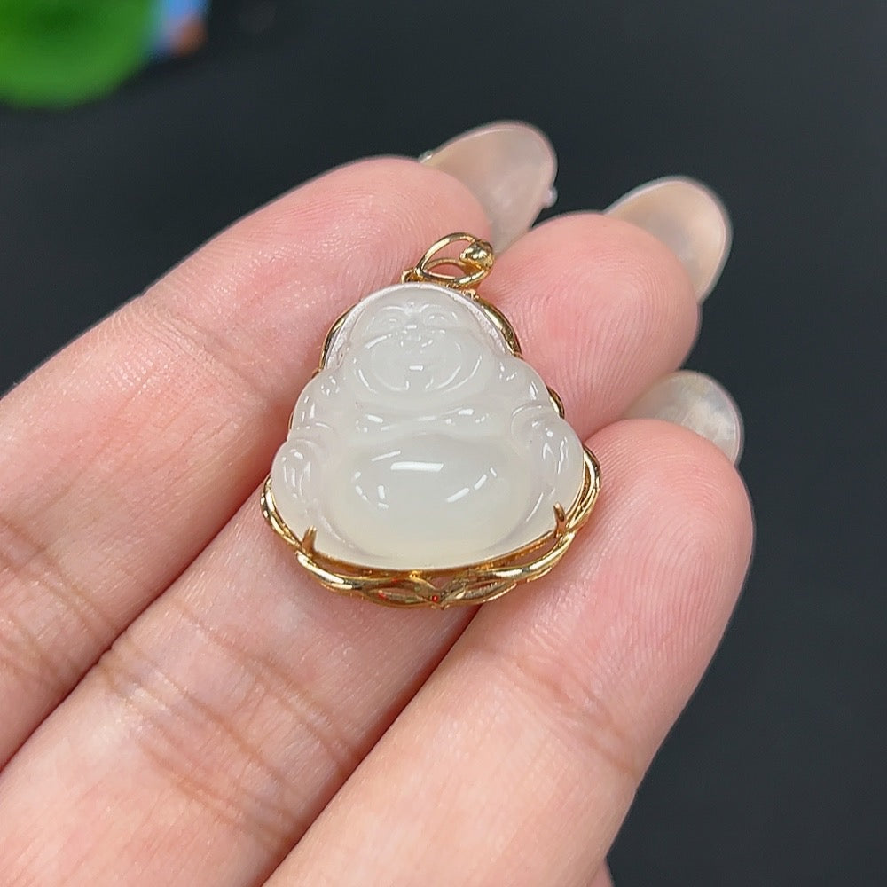 Hetian jade Buddha pendant in 18K gold with diamond accents, weighing approx. 4g, featuring intricate craftsmanship and detailed design.