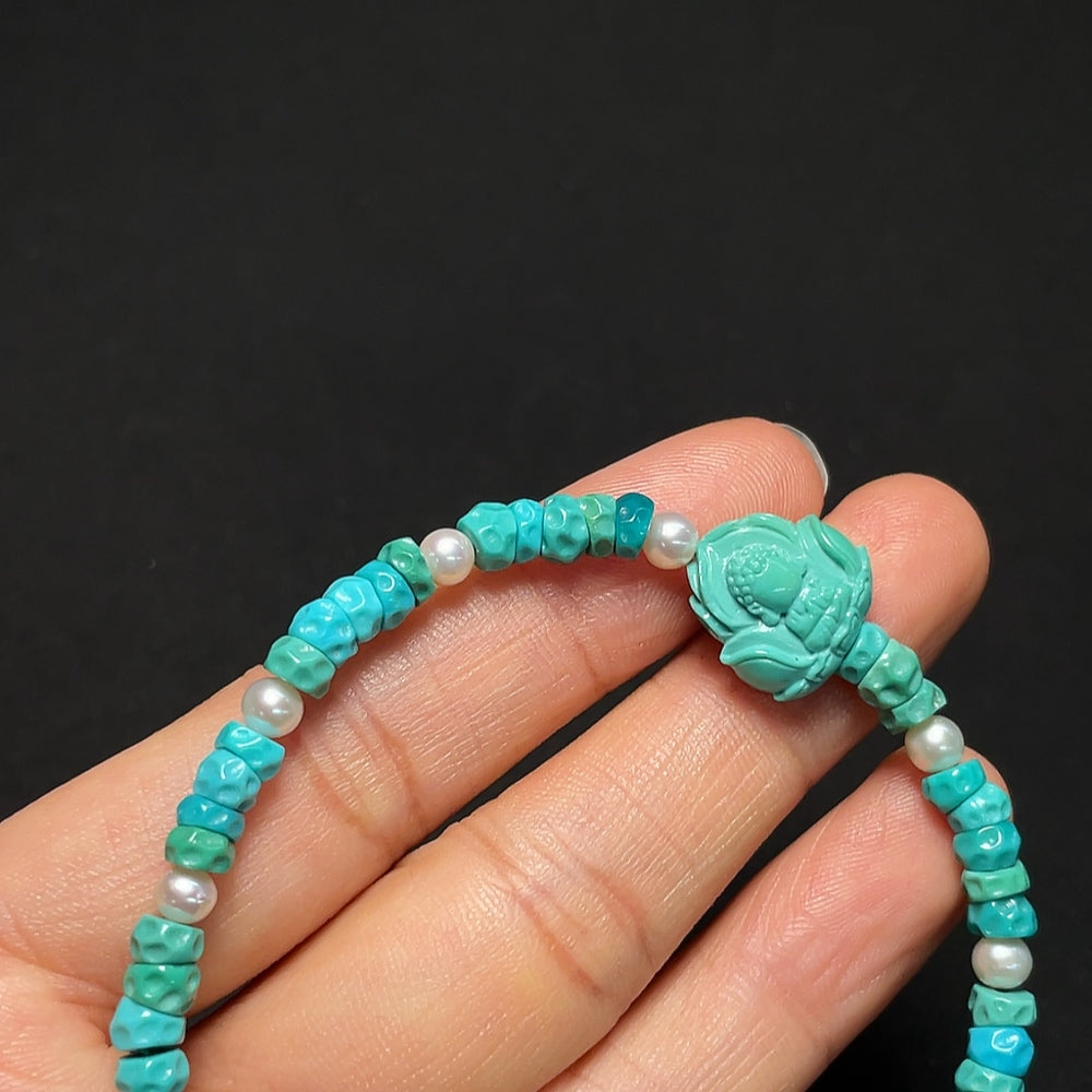 Turquoise bracelet with gold and pearl accents, featuring 4.2-13.3mm stones, approximately 9g weight, natural mineral components.