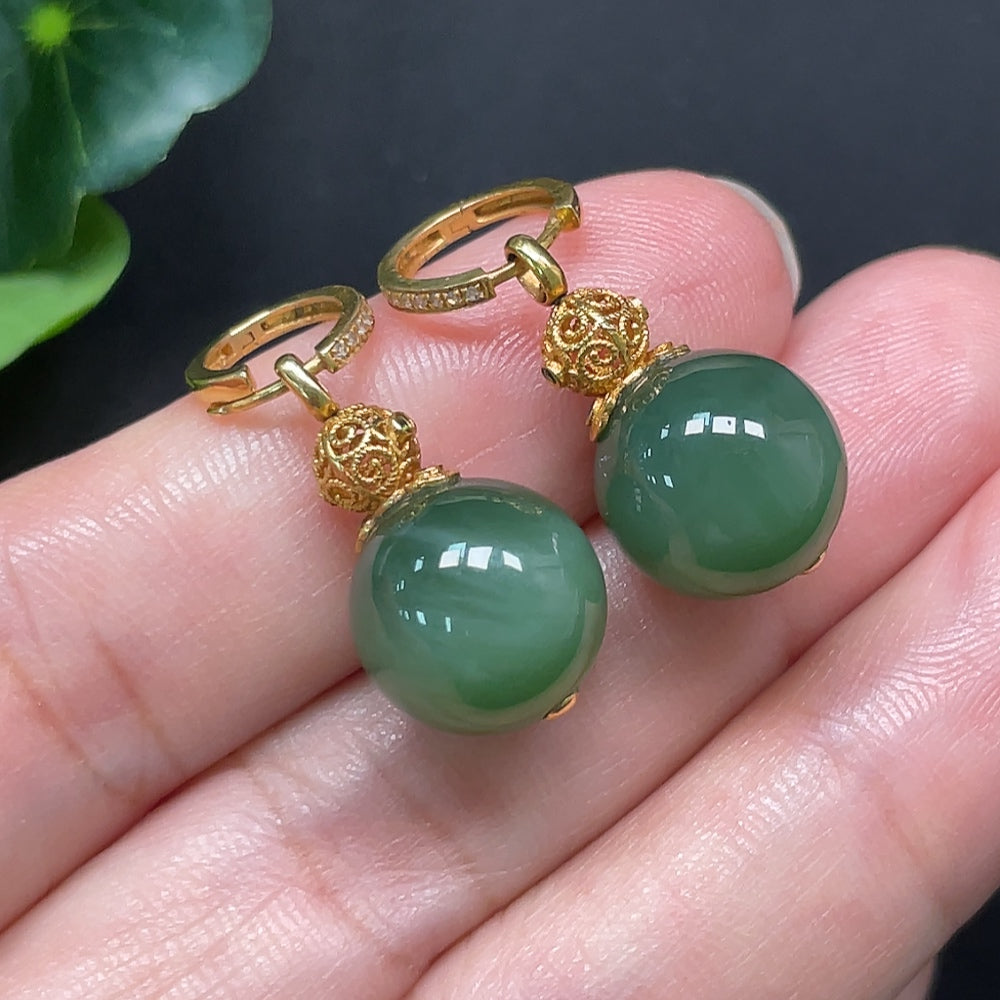 Hetian jade earrings with 18K gold and diamond accents, HKHQ, featuring 11.6mm size and elegant design.