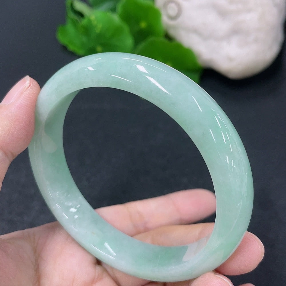 Jadeite round bracelet with 58mm diameter, weighing approximately 54.45g, featuring smooth green jade beads.