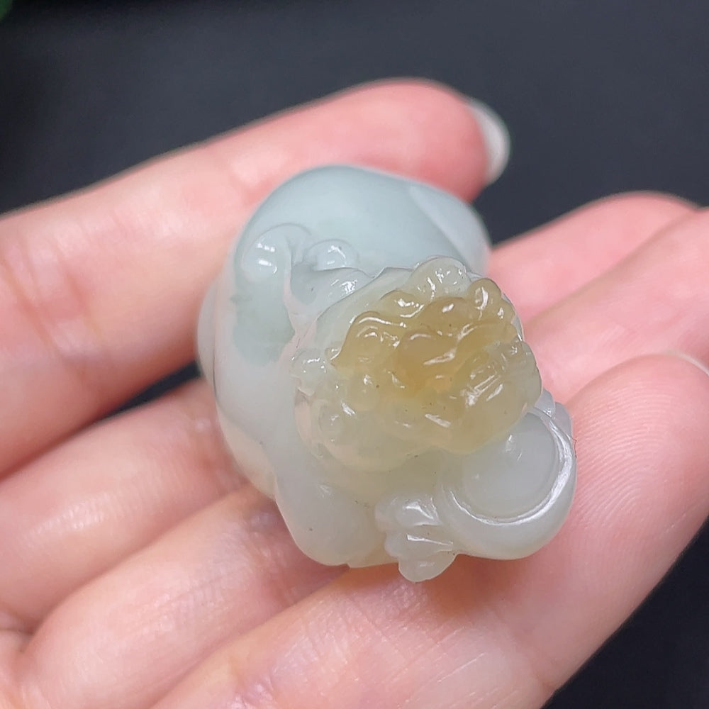 Hetian Jade Pixiu pendant with intricate carvings, weighing approximately 73.49g, crafted by HKHQ, showcasing traditional jade artistry.