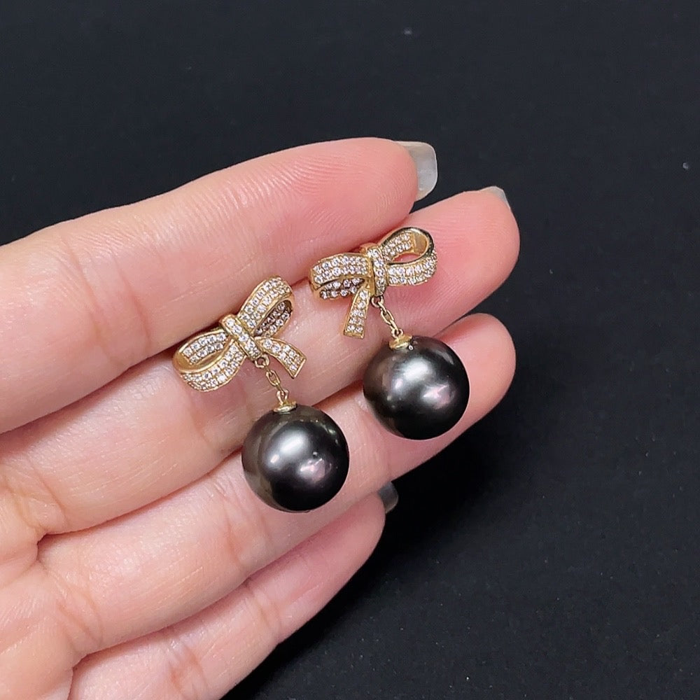 HKHQ seawater pearl earrings set in 14k gold, 12.1mm size, elegant jewelry with non-diamond pearls on a white background