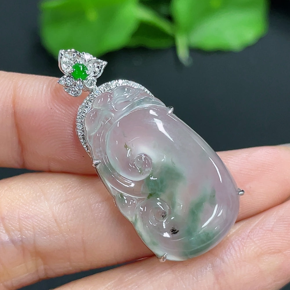 Jadeite Ruyi pendant with 18K gold accents and diamond details, showcasing a smooth, polished jade surface and intricate design.