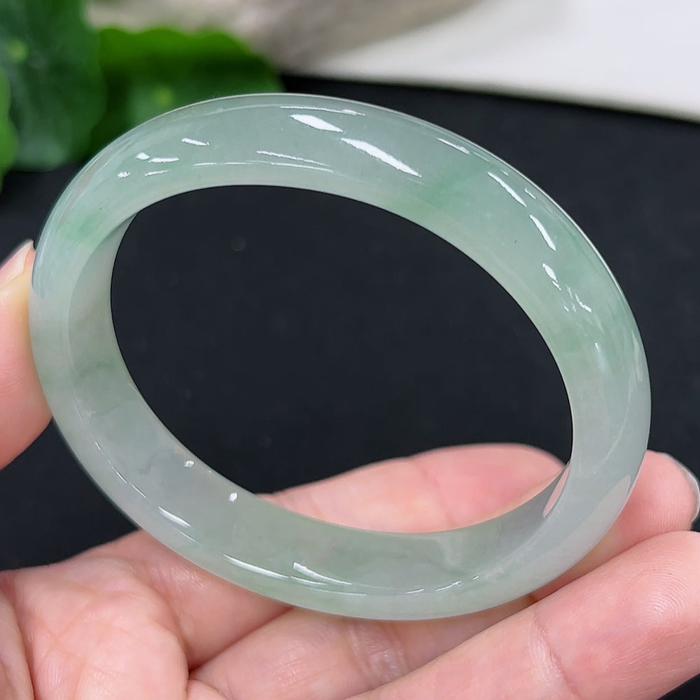 HKHQ jadeite concubine bracelet with adjustable sizes, featuring polished green jade stones and intricate craftsmanship.