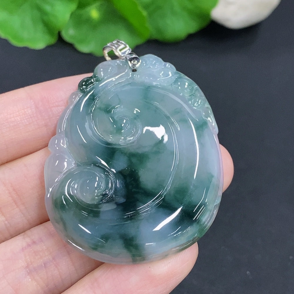 Damaged jadeite Ruyi pendant with 18K gold clasp from HKHQ, showcasing smooth jade surface and intricate design details.