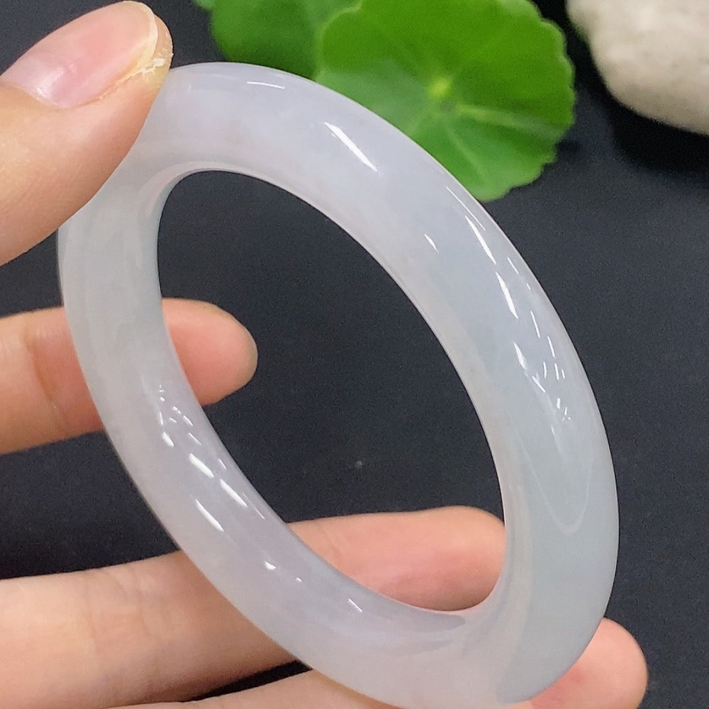 Jadeite round bangle from HKHQ, size 50.2, with a total weight of 50.18g, showcasing smooth polished jade surface.